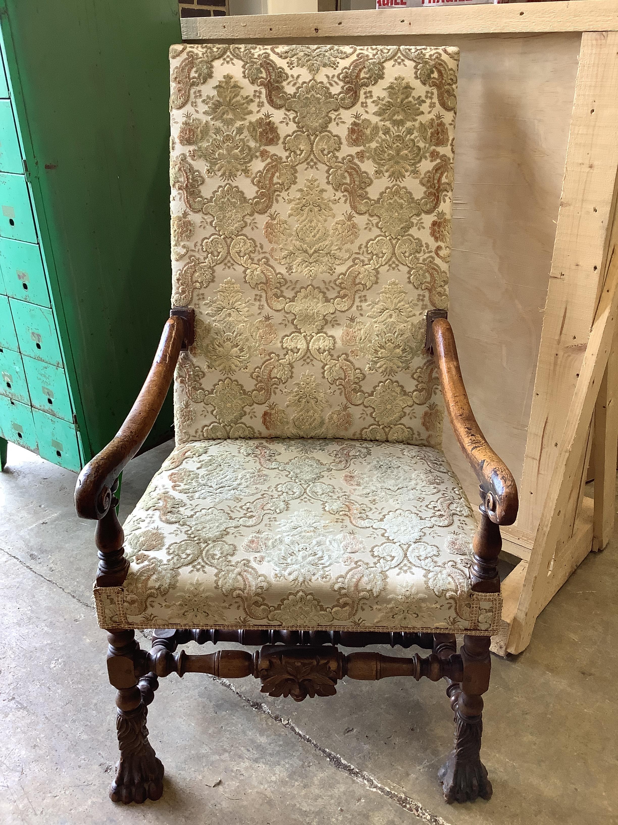 A 17th century style Flemish walnut elbow chair, width 64cm, depth 79cm, height 125cm